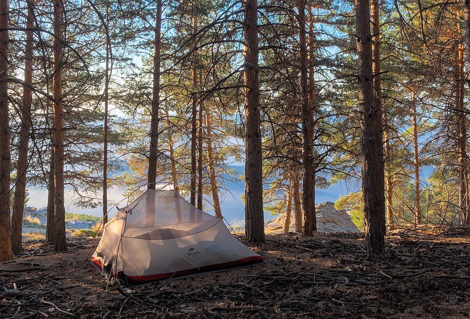 A tent on a mountain camping trail